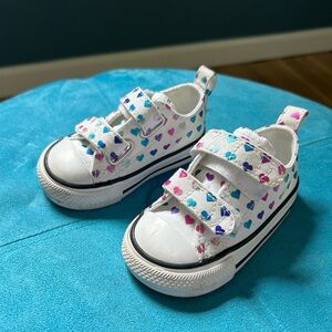 Converse white sneakers with hearts
